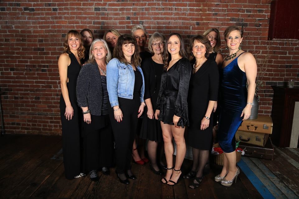 Members of the Adaline Coffman Guild pose for a photograph at a past gala.